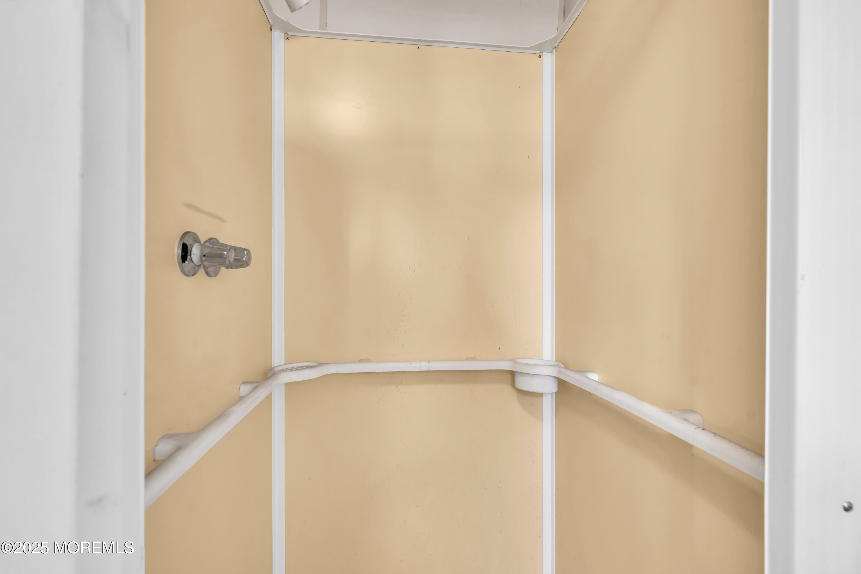 1812 Fernwood Road, Unit 2 Belmar, NJ 07719 - Photo 30 of 41 a view of walk in closet with empty racks