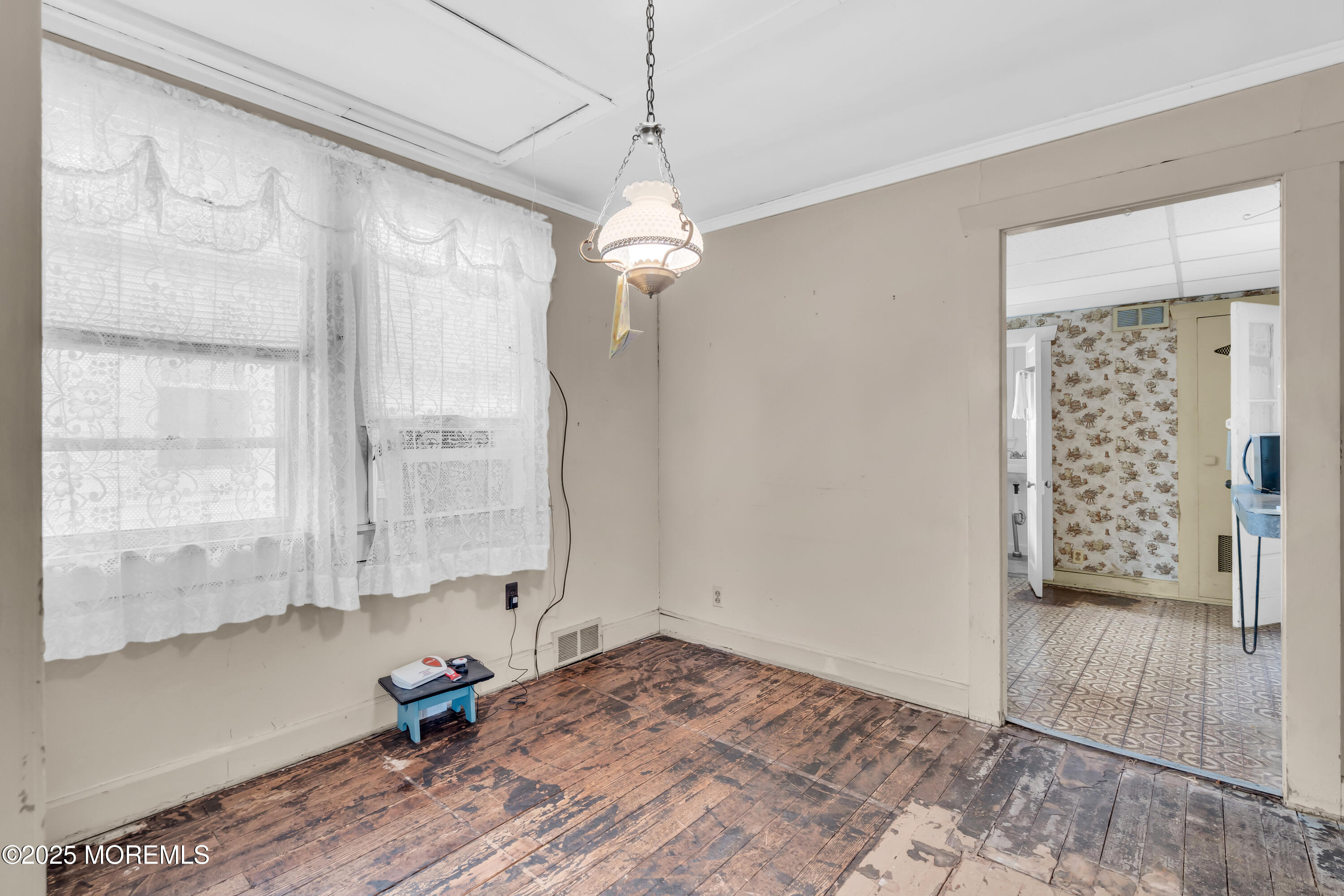 1812 Fernwood Road, Unit 2 Belmar, NJ 07719 - Photo 10 of 41 a view of empty room with wooden floor and fan