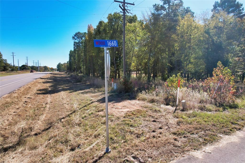 7559 Highway 69 Alba, TX 75410 - Photo 7 of 25 a street sign on the side of the road