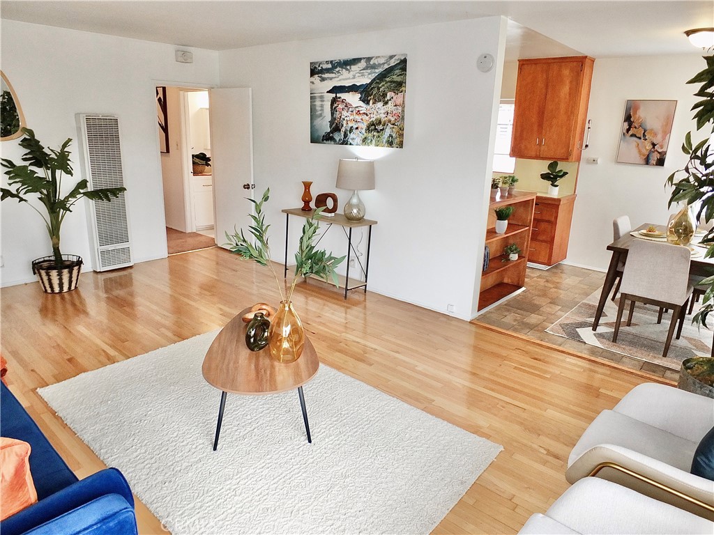 1335 East Appleton Street, Unit 8 Long Beach, CA 90802 - Photo 13 of 47 a living room with furniture and a wooden floor