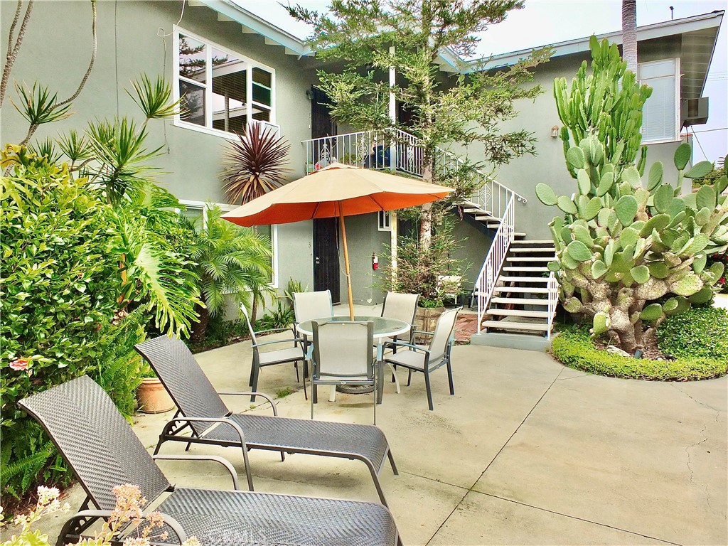 1335 East Appleton Street, Unit 8 Long Beach, CA 90802 - Photo 3 of 47 a view of backyard with outdoor seating and plants