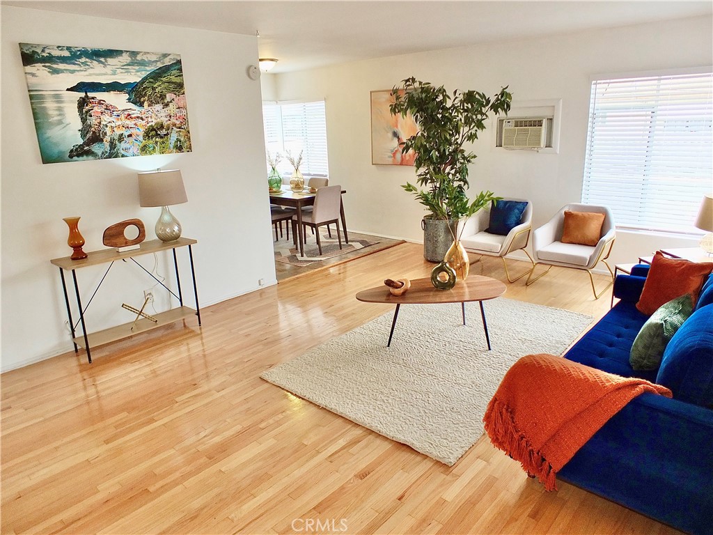 1335 East Appleton Street, Unit 8 Long Beach, CA 90802 - Photo 6 of 47 a living room with furniture and wooden floor