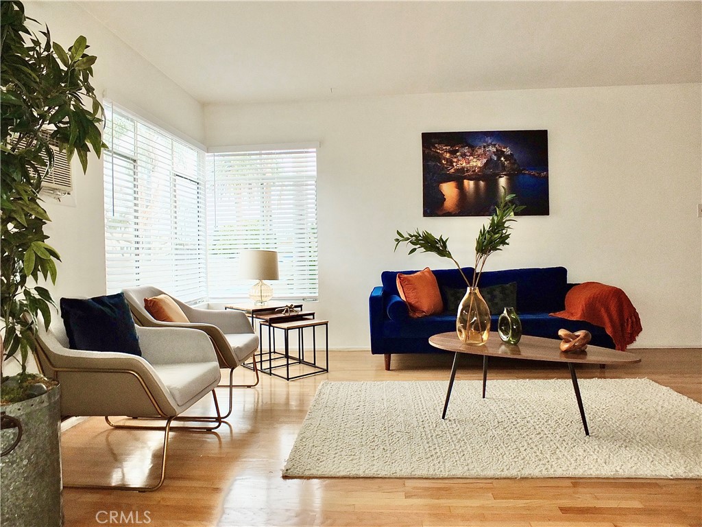 1335 East Appleton Street, Unit 8 Long Beach, CA 90802 - Photo 9 of 47 a living room with furniture rug and window