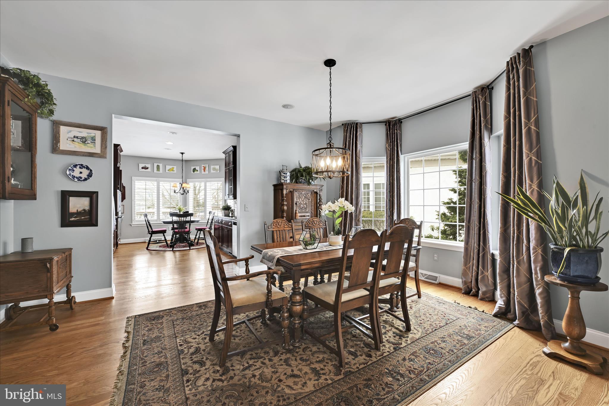 728 Woodfield Drive Lititz, PA 17543 - Photo 12 of 61 a view of a dining room with furniture window and wooden floor