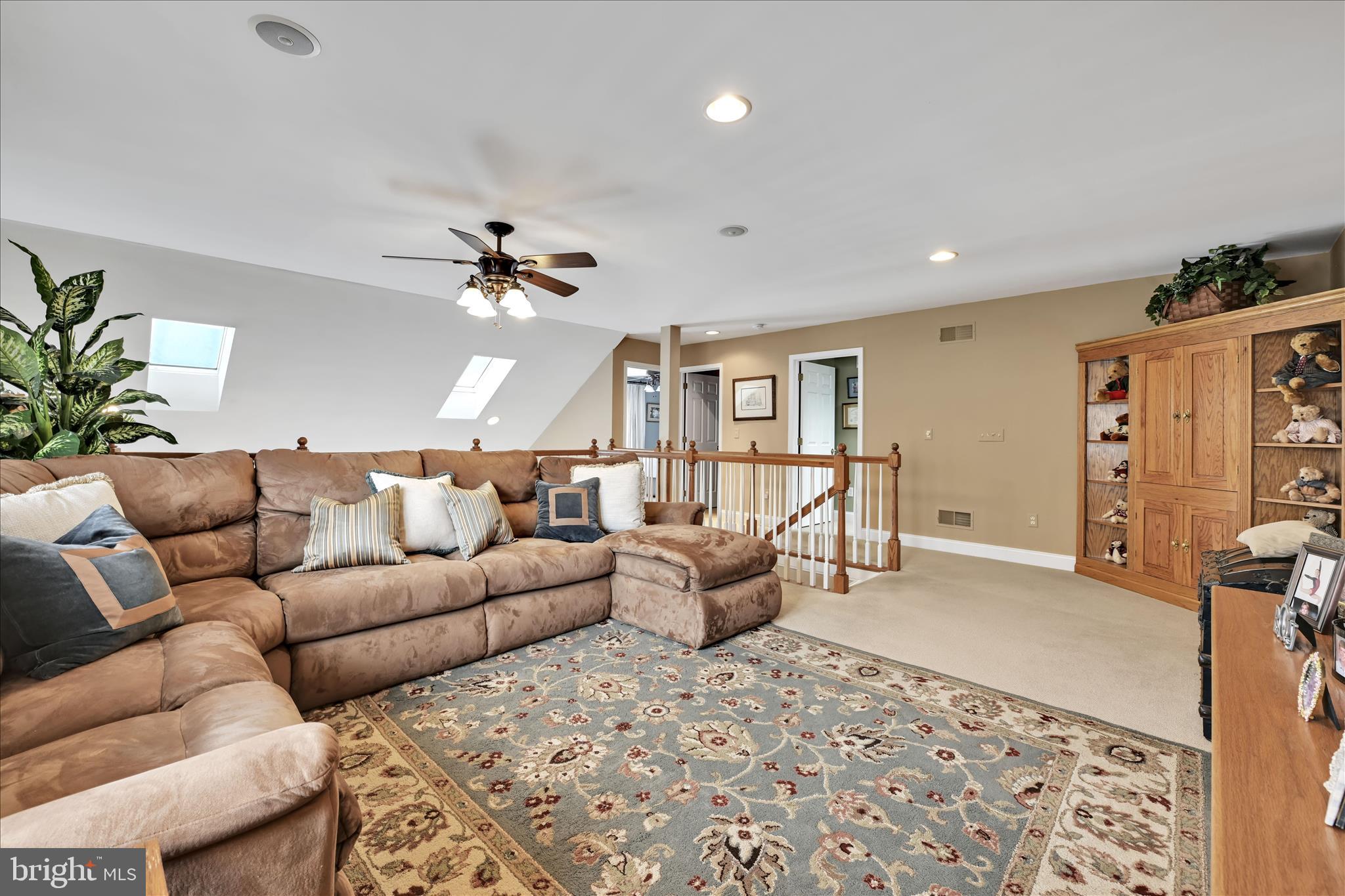 728 Woodfield Drive Lititz, PA 17543 - Photo 20 of 61 a living room with furniture a chandelier and a rug
