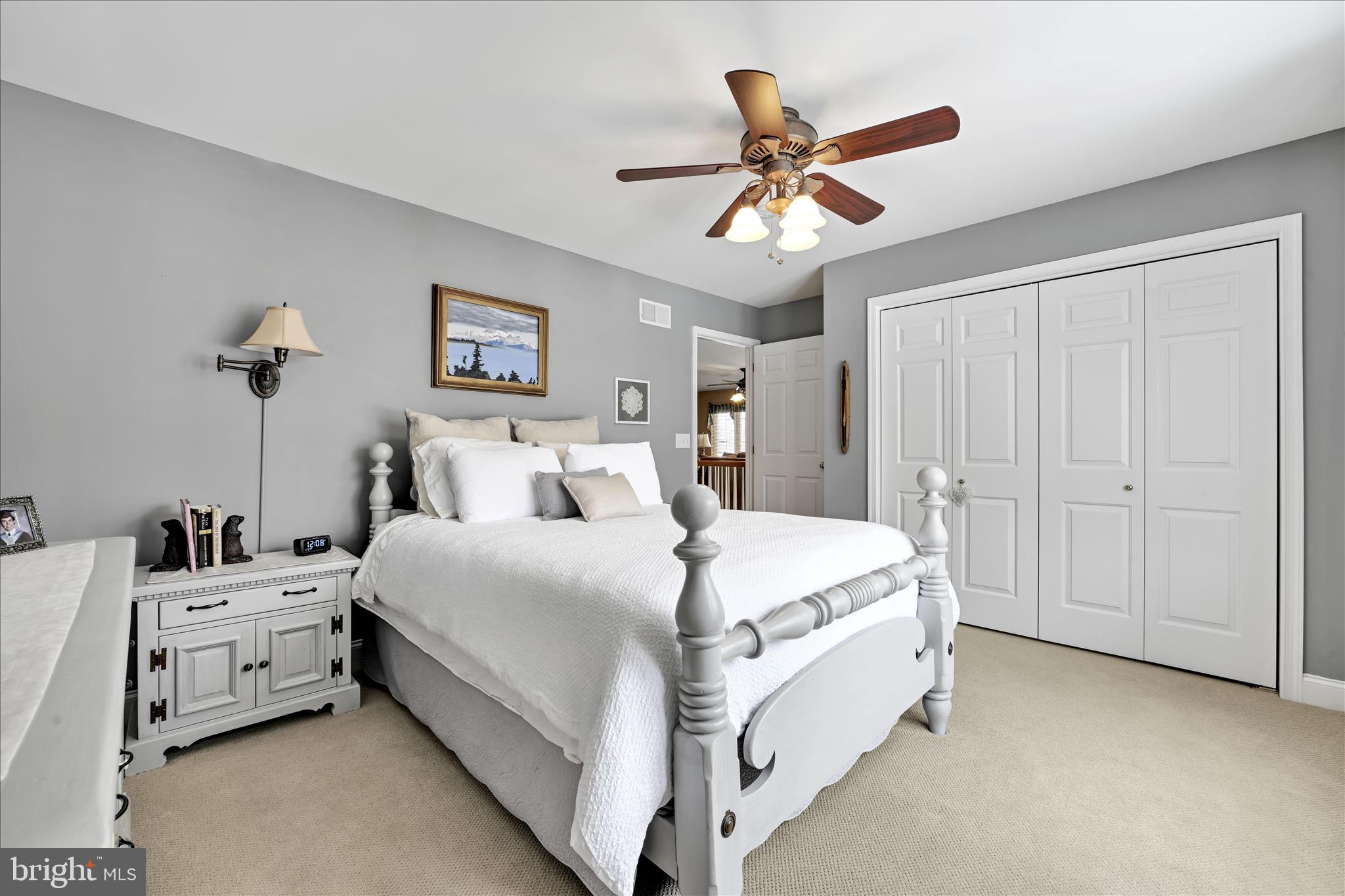 728 Woodfield Drive Lititz, PA 17543 - Photo 27 of 61 a bed room with a bed and a ceiling fan