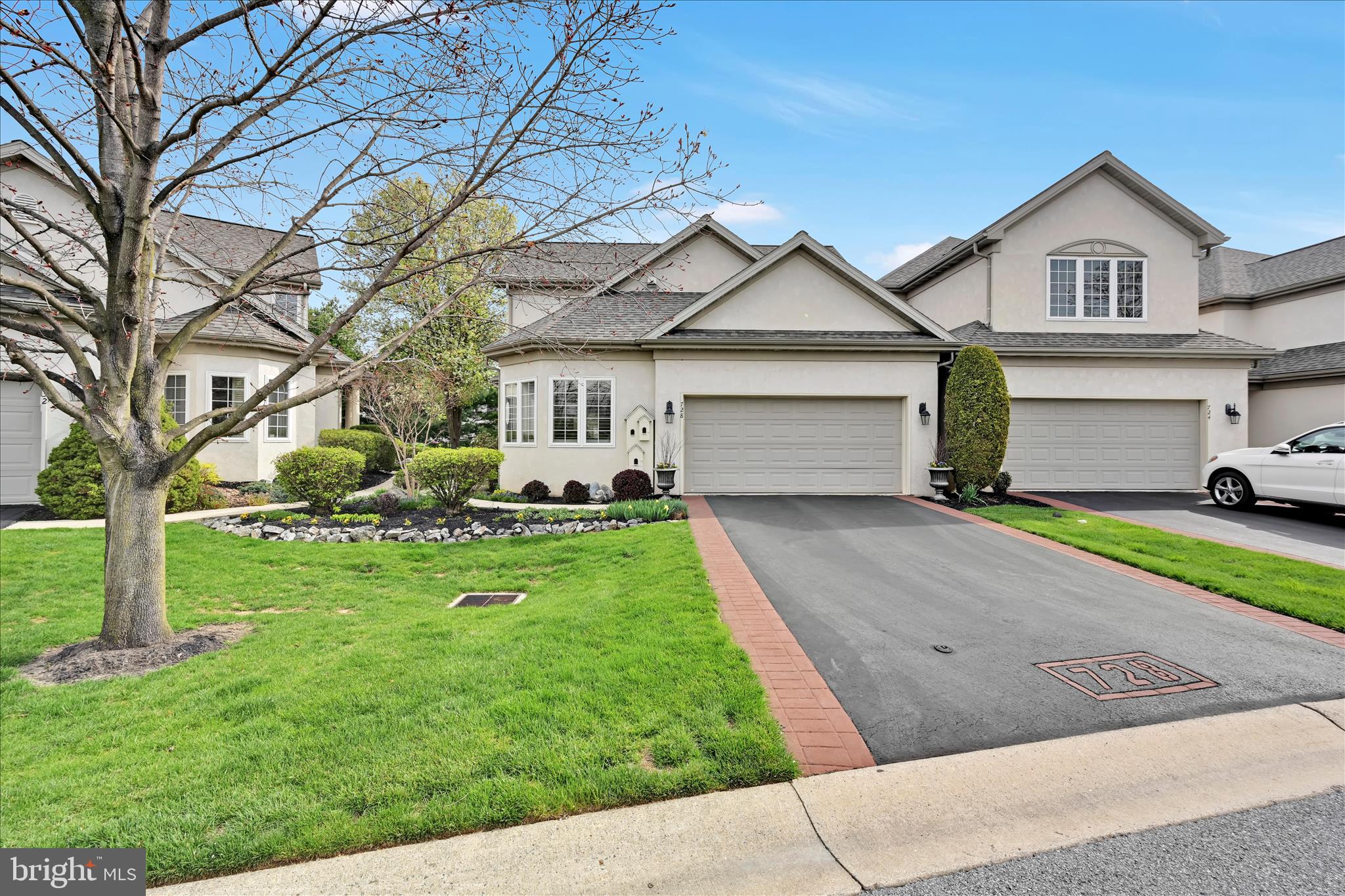 728 Woodfield Drive Lititz, PA 17543 - Photo 3 of 61 a front view of a house with a yard and garage