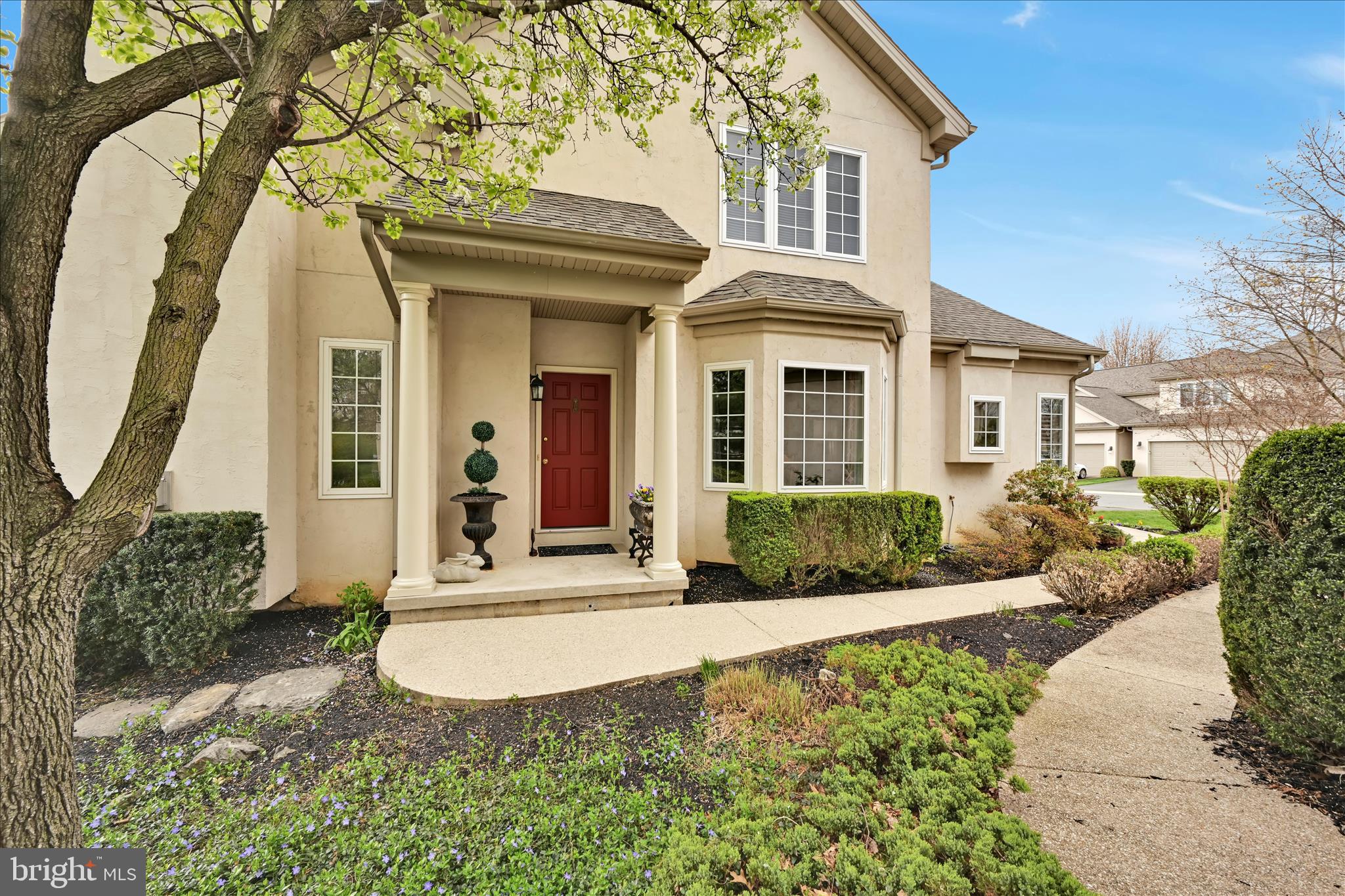 728 Woodfield Drive Lititz, PA 17543 - Photo 5 of 61 a front view of a house with a yard
