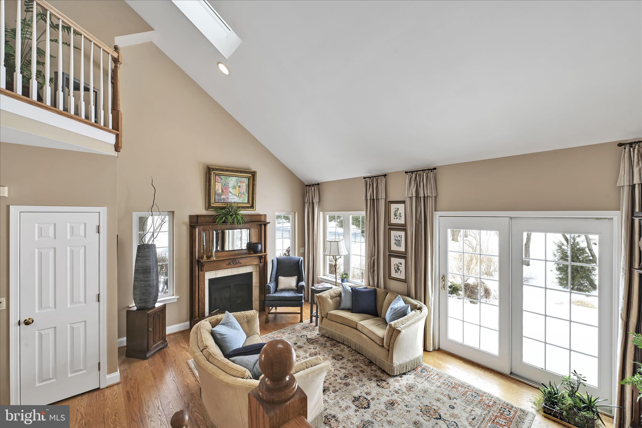 728 Woodfield Drive Lititz, PA 17543 - Photo 6 of 61 a living room with furniture large window and wooden floor