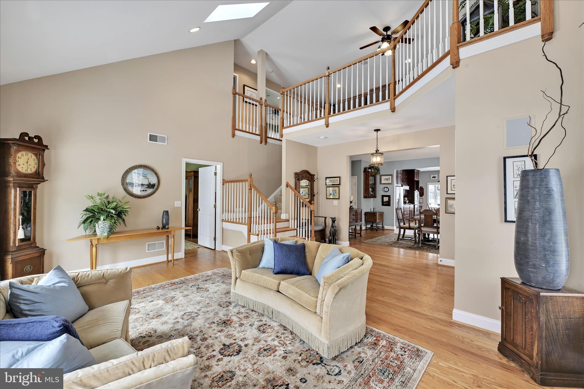 728 Woodfield Drive Lititz, PA 17543 - Photo 7 of 61 a living room with furniture and a clock