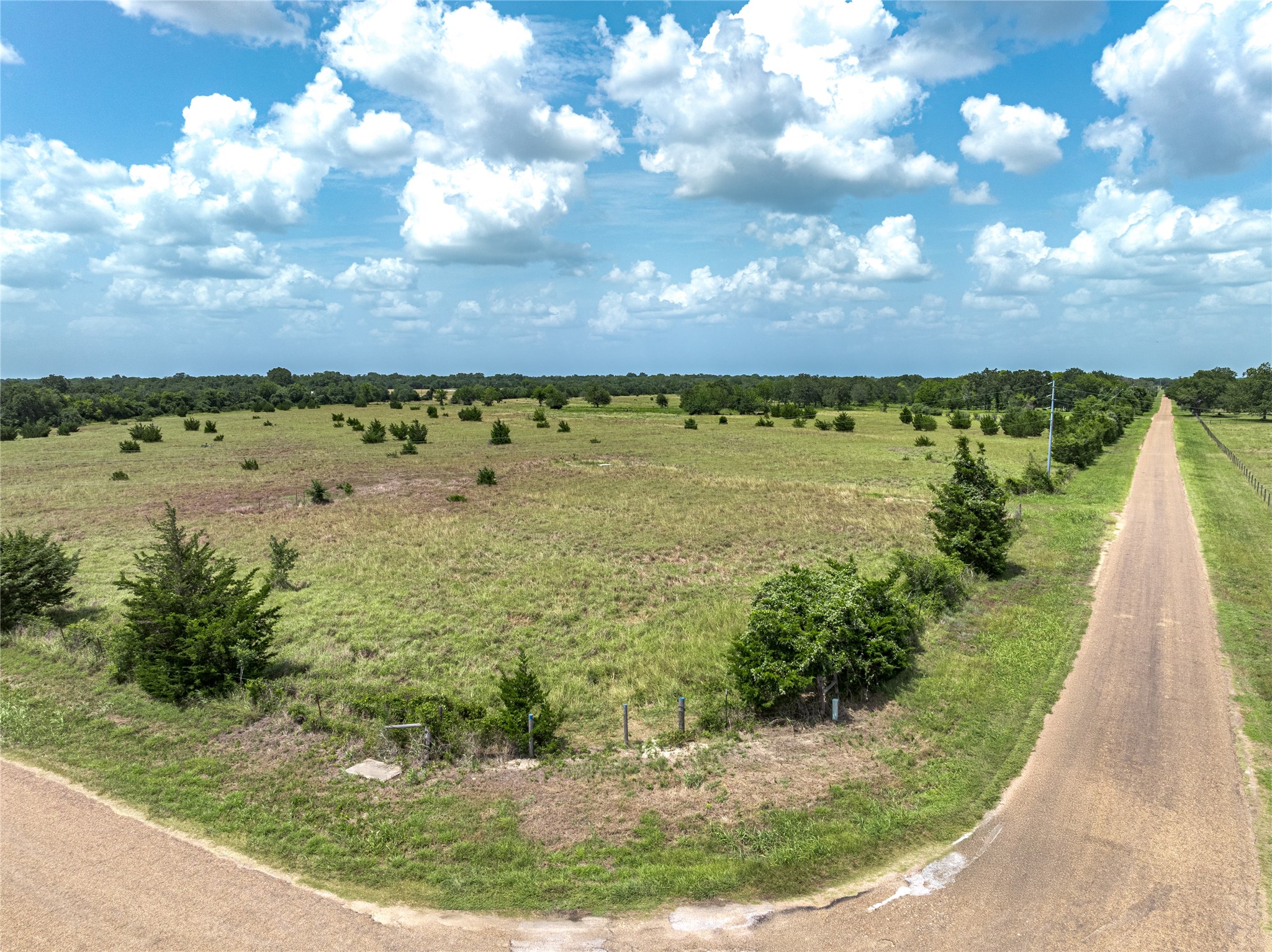 6700 Walhalla Road Round Top, TX 78954 - Photo 5 of 17 a view of a lake with a yard