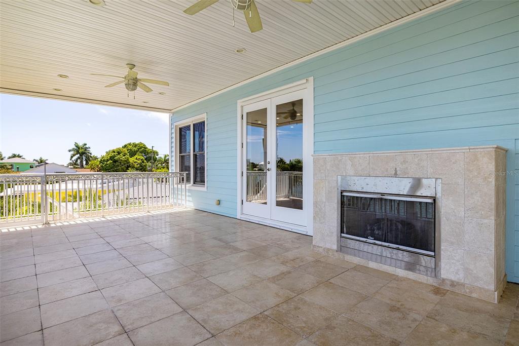 821 Bay Point Drive Madeira Beach, FL 33708 - Photo 19 of 66 a view of a house and a balcony