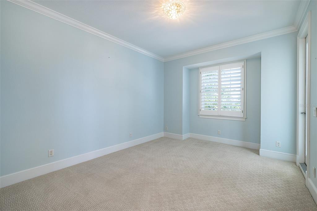 821 Bay Point Drive Madeira Beach, FL 33708 - Photo 20 of 66 an empty room with windows
