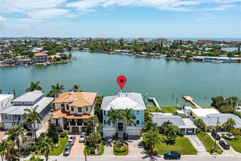821 Bay Point Drive Madeira Beach, FL 33708 - Photo 2 of 66 an aerial view of houses and roads