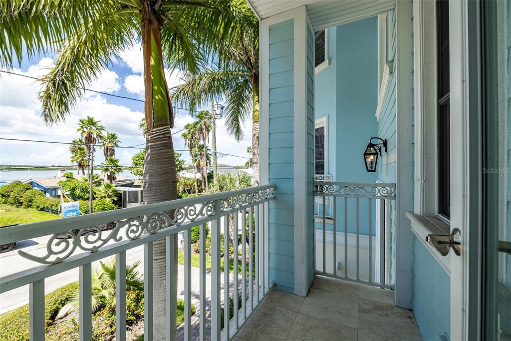 821 Bay Point Drive Madeira Beach, FL 33708 - Photo 23 of 66 a view of a street from a balcony