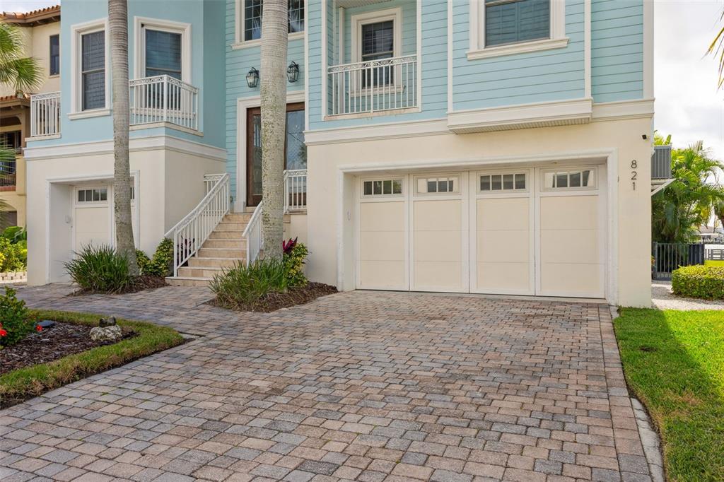 821 Bay Point Drive Madeira Beach, FL 33708 - Photo 50 of 66 a view of a house with a yard