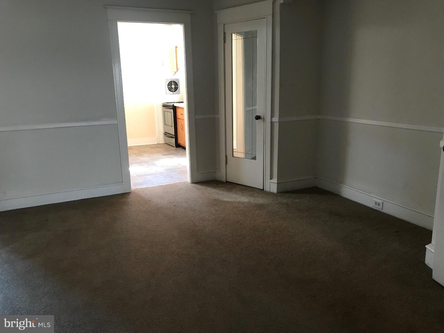 212 Wembly Road Upper Darby, PA 19082 - Photo 3 of 12 a view of a room that has a window in it
