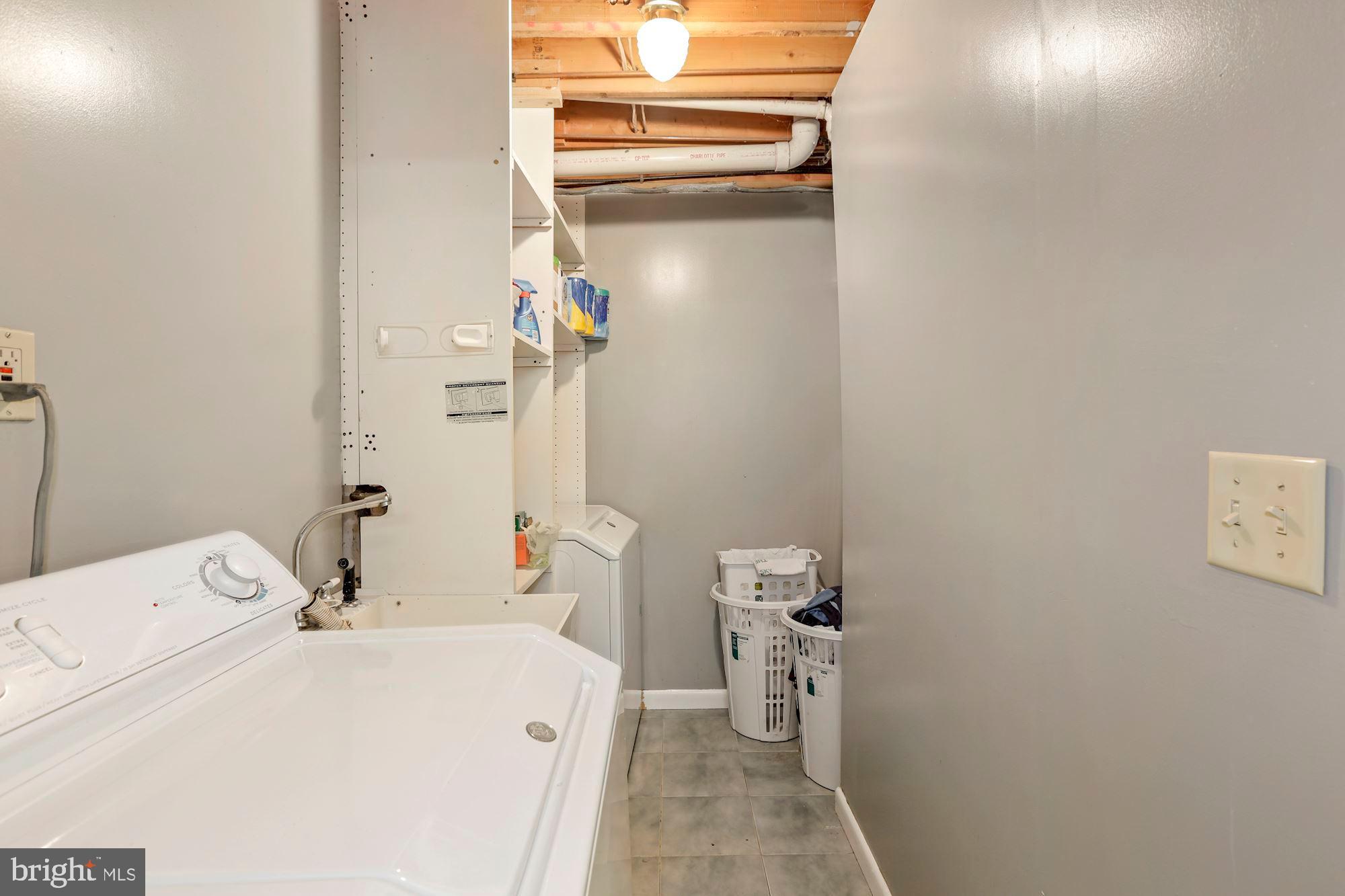 8604 Compass Court Laurel, MD 20708 - Photo 34 of 41 Laundry area in basement