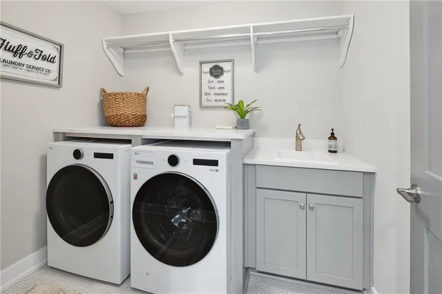 a utility room with dryer and washer