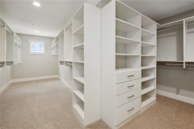 a view of an empty walk in closet