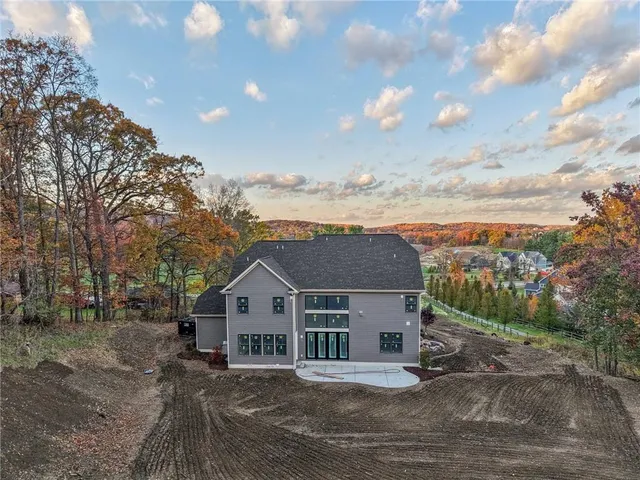 a view of a house with a big yard