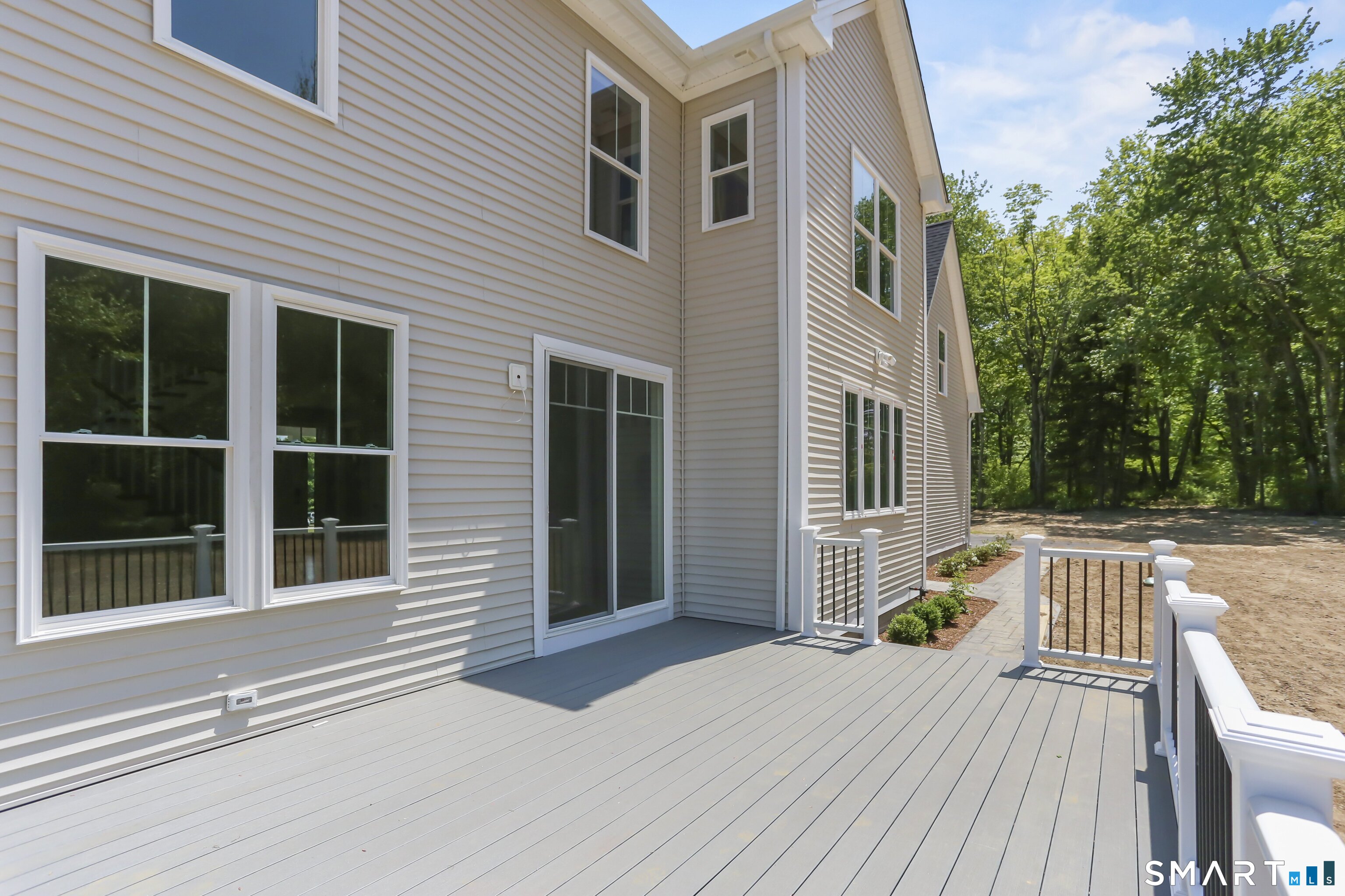 110 Porters Hill Road Trumbull, CT 06611 - Photo 22 of 47 a view of a house with a patio
