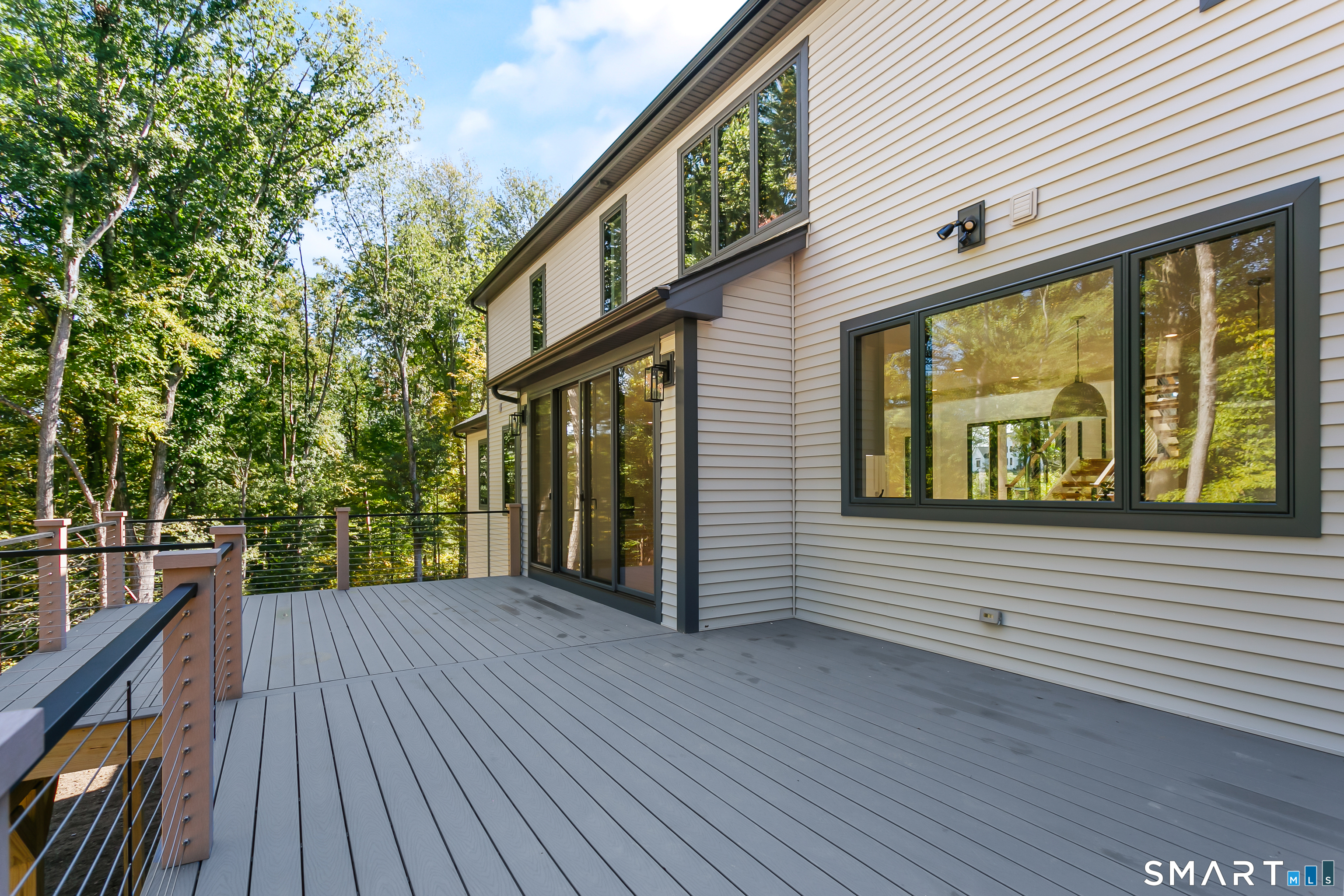 110 Porters Hill Road Trumbull, CT 06611 - Photo 25 of 47 a view of a house with backyard and wooden floor