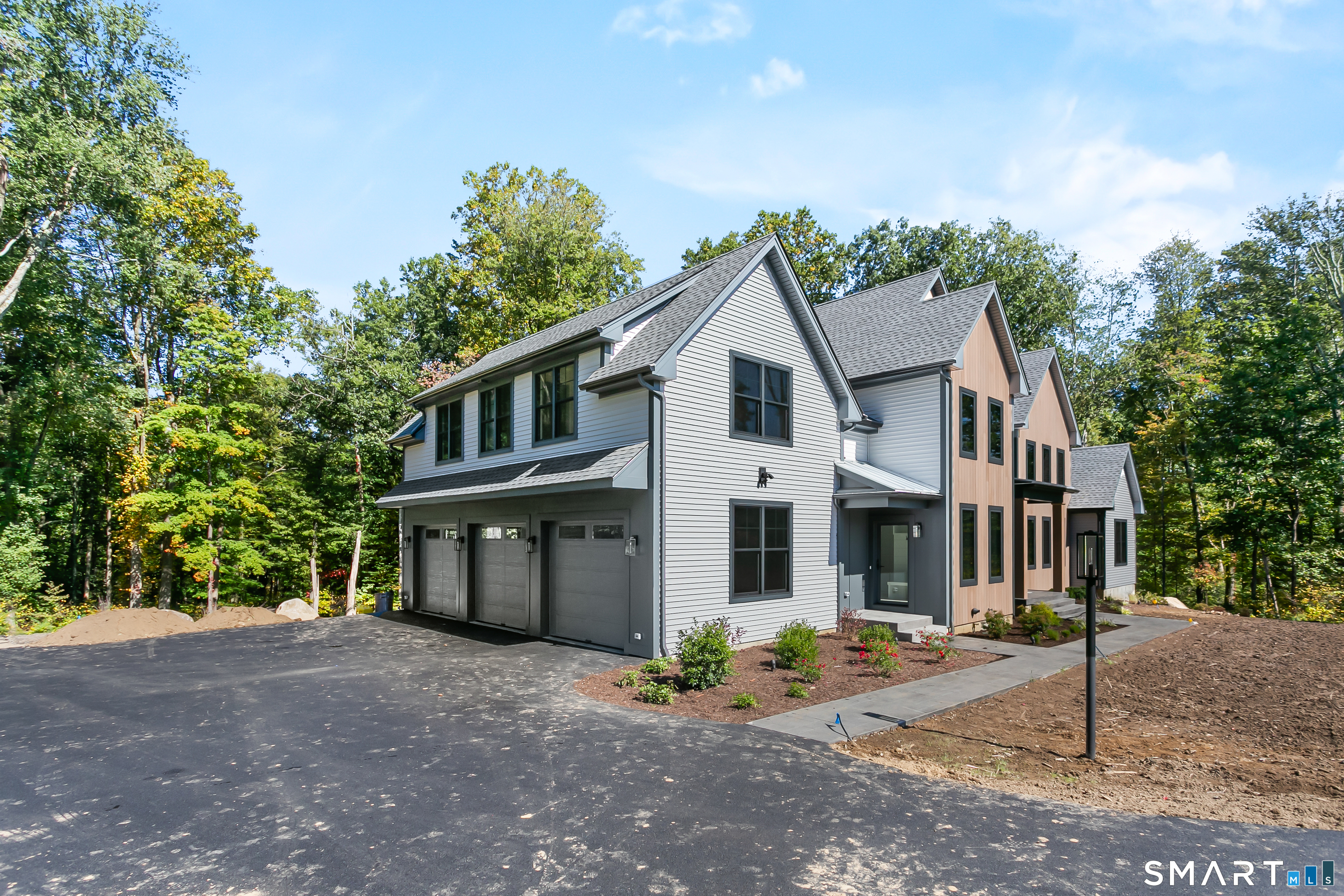 110 Porters Hill Road Trumbull, CT 06611 - Photo 26 of 47 a front view of a house with garden