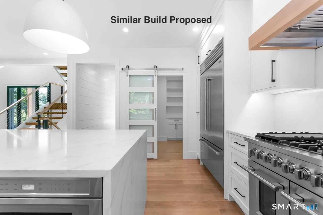 110 Porters Hill Road Trumbull, CT 06611 - Photo 33 of 47 a kitchen with stainless steel appliances a stove and a refrigerator