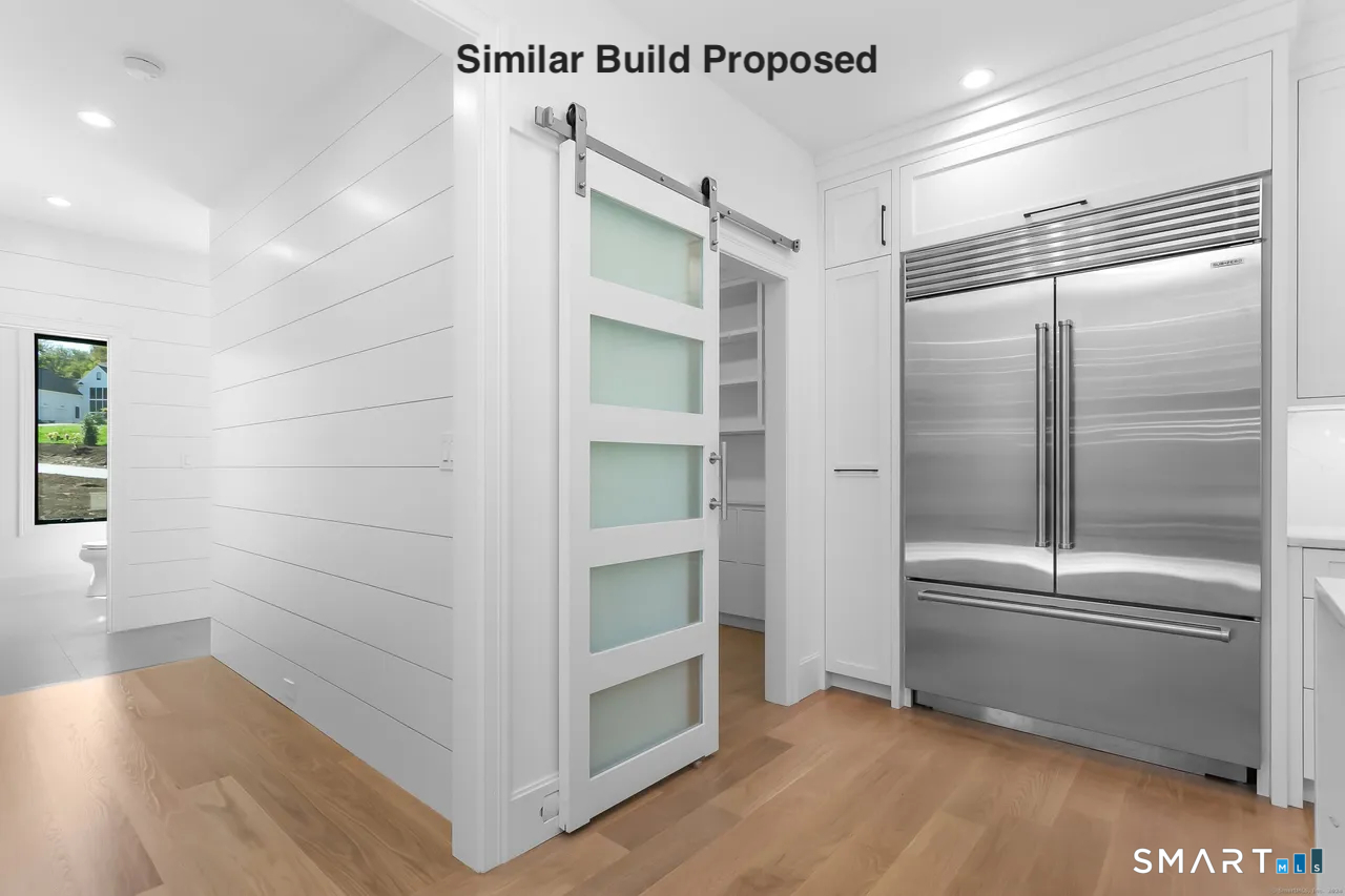 110 Porters Hill Road Trumbull, CT 06611 - Photo 34 of 47 a view of walk in closet with empty racks