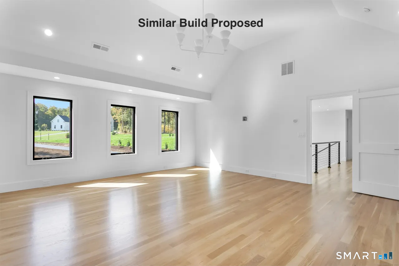 110 Porters Hill Road Trumbull, CT 06611 - Photo 37 of 47 a view of an empty room with wooden floor and window