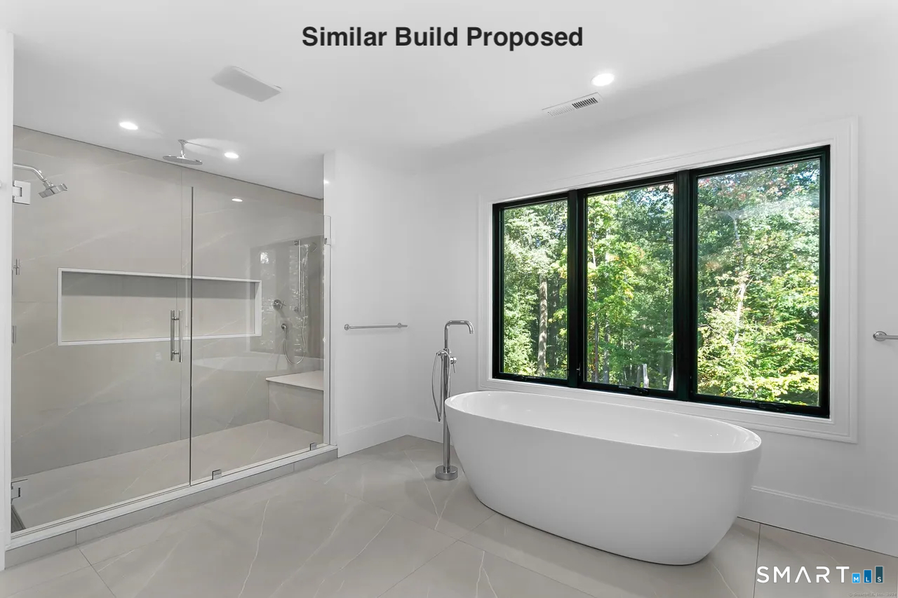 110 Porters Hill Road Trumbull, CT 06611 - Photo 43 of 47 a bathroom with a bathtub and a shower