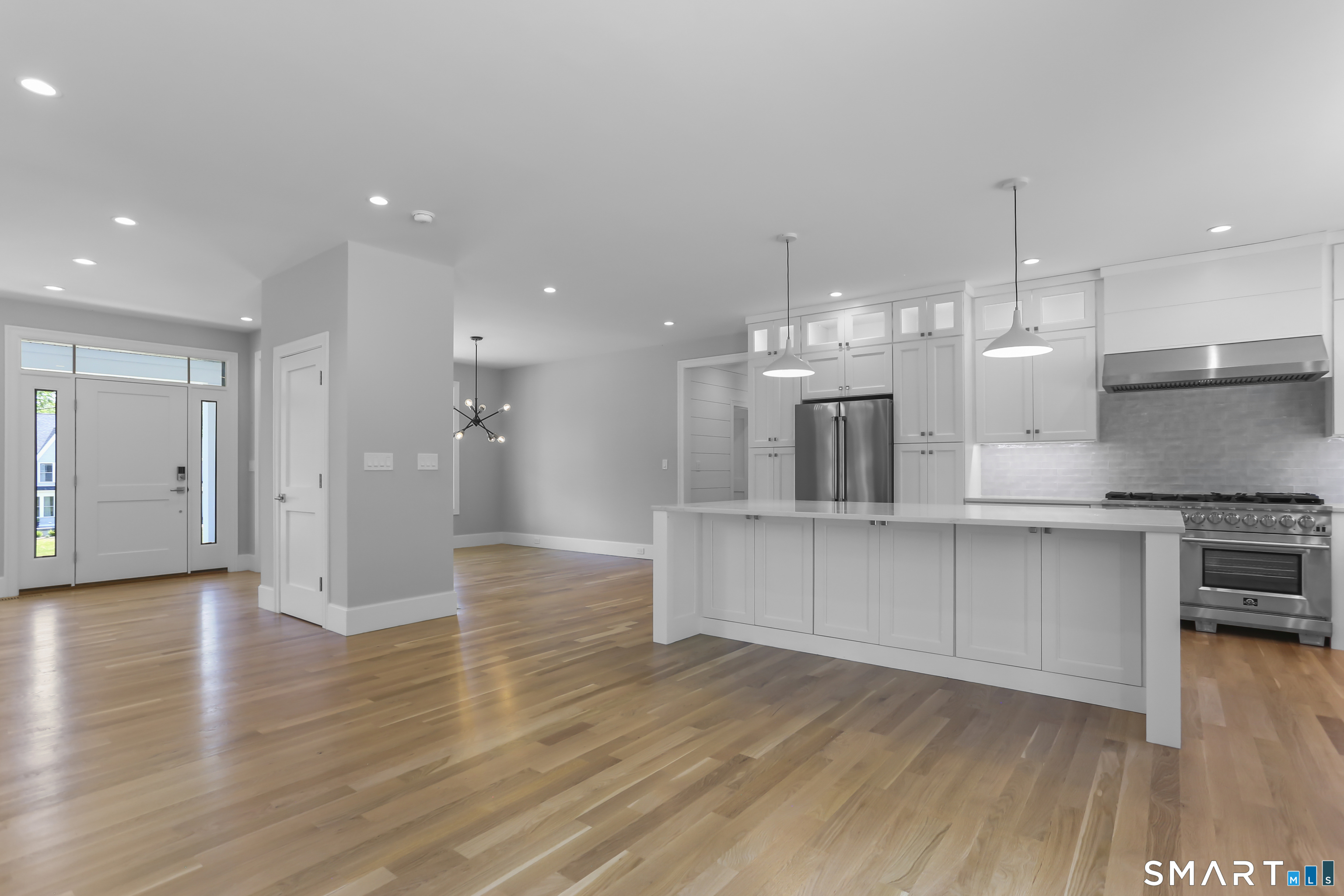 110 Porters Hill Road Trumbull, CT 06611 - Photo 6 of 47 a large kitchen with granite countertop a large counter top stainless steel appliances and cabinets