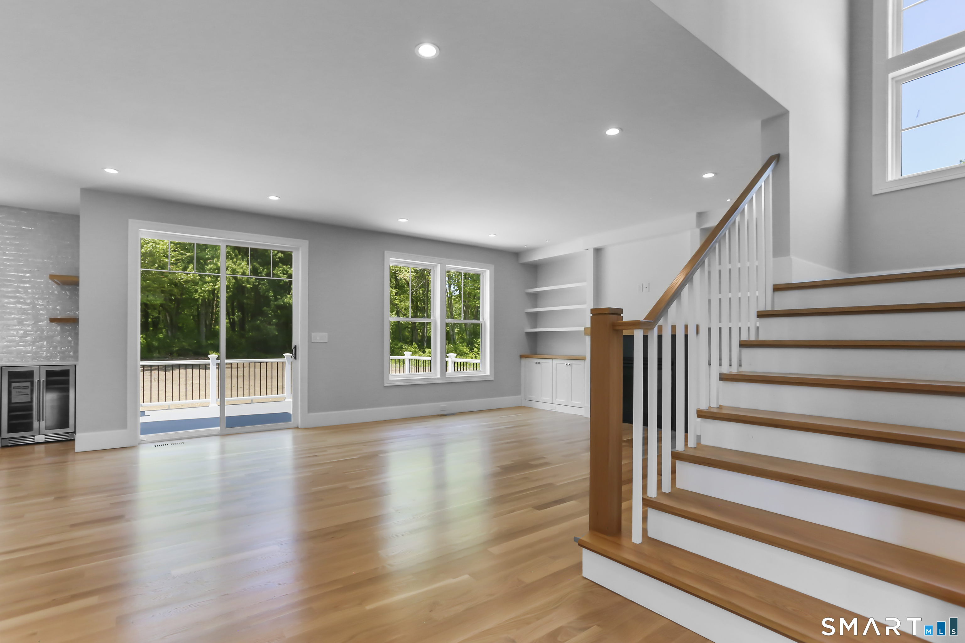 110 Porters Hill Road Trumbull, CT 06611 - Photo 10 of 47 a view of a livingroom with wooden floor and entryway