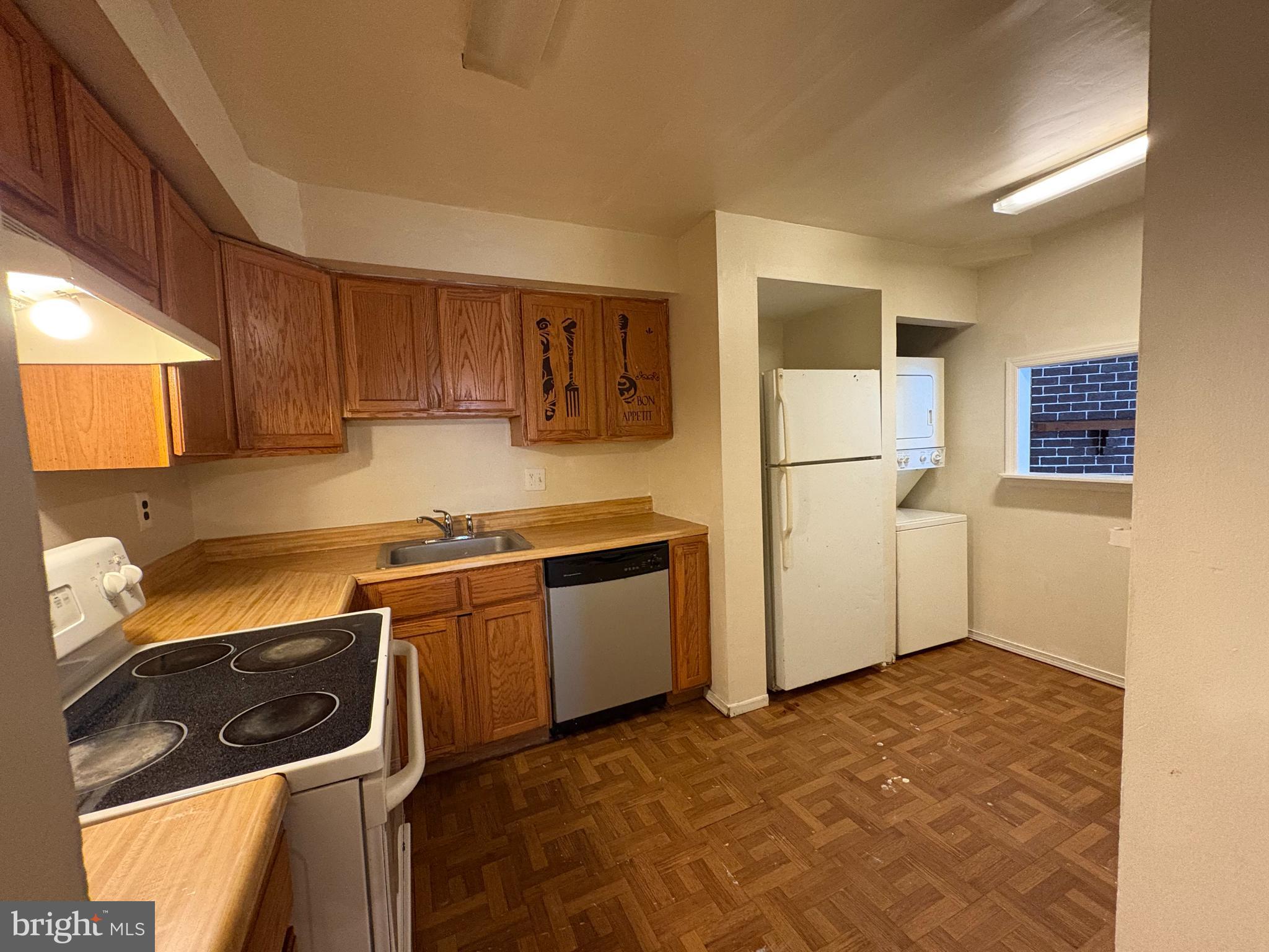 1007 Timber Creek Road Clementon, NJ 08021 - Photo 7 of 13 a kitchen with a refrigerator stove and microwave