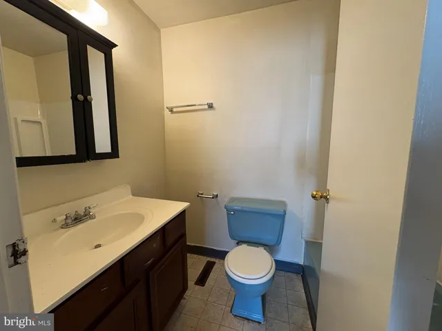a bathroom with a sink and a toilet
