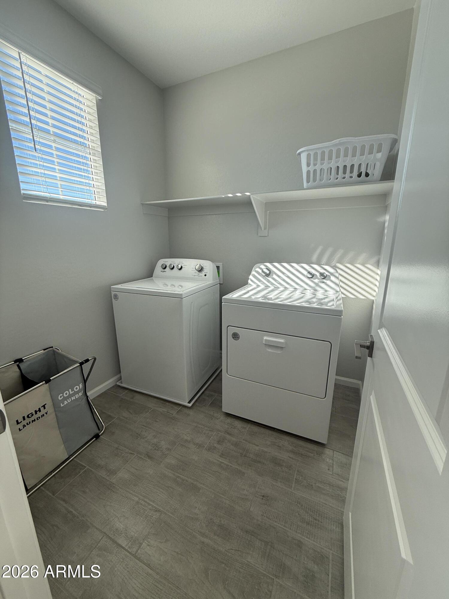 18140 West Daley Lane Surprise, AZ 85387 - Photo 12 of 23 a utility room with dryer and washer
