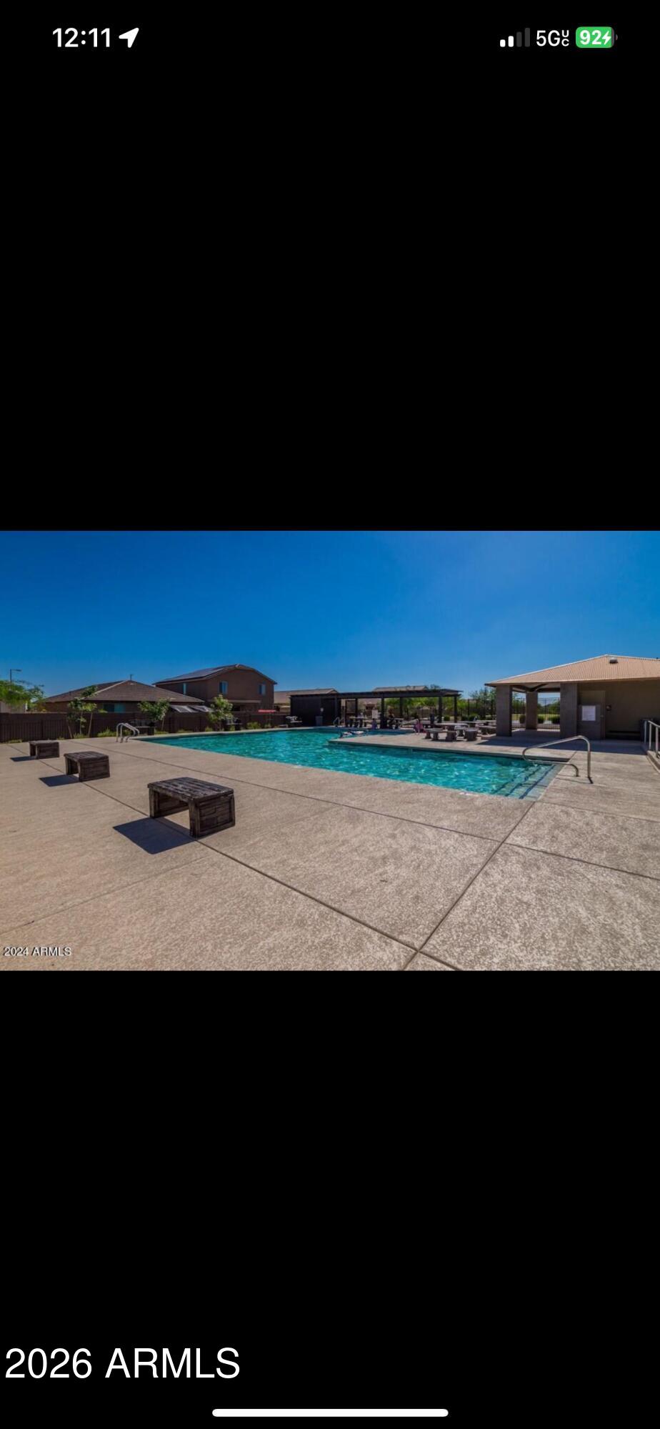 18140 West Daley Lane Surprise, AZ 85387 - Photo 21 of 23 a view of a room with wooden floor