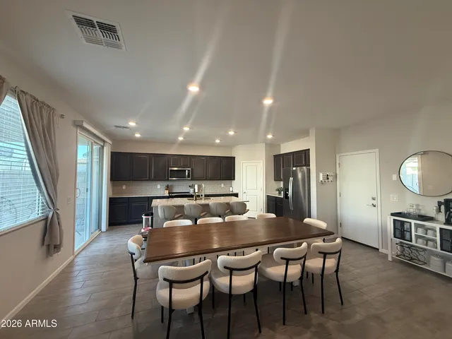 a view of a dining room with furniture