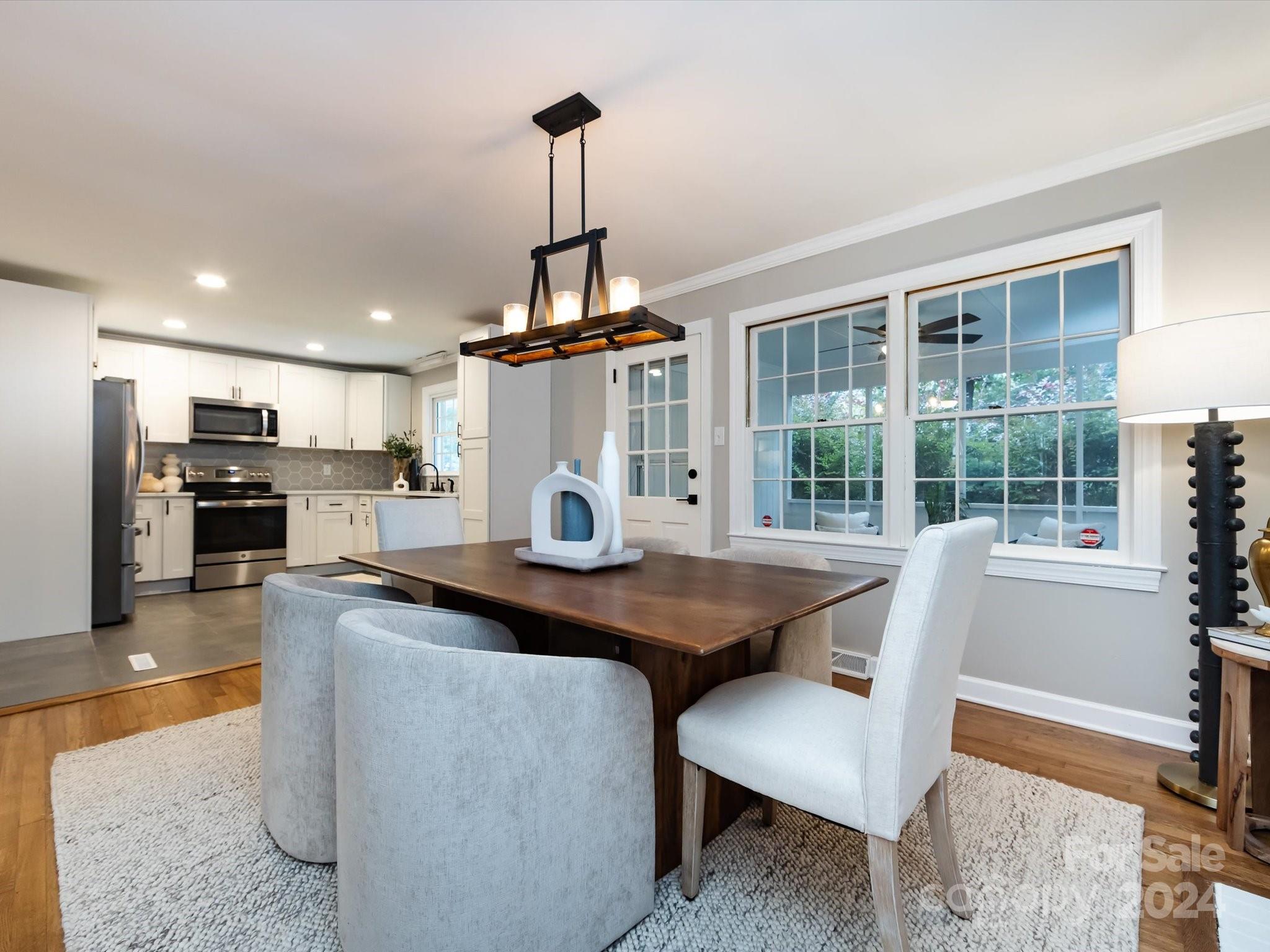3133 Spring Valley Road Charlotte, NC 28210 - Photo 12 of 25 a view of a dining room with furniture window and outside view