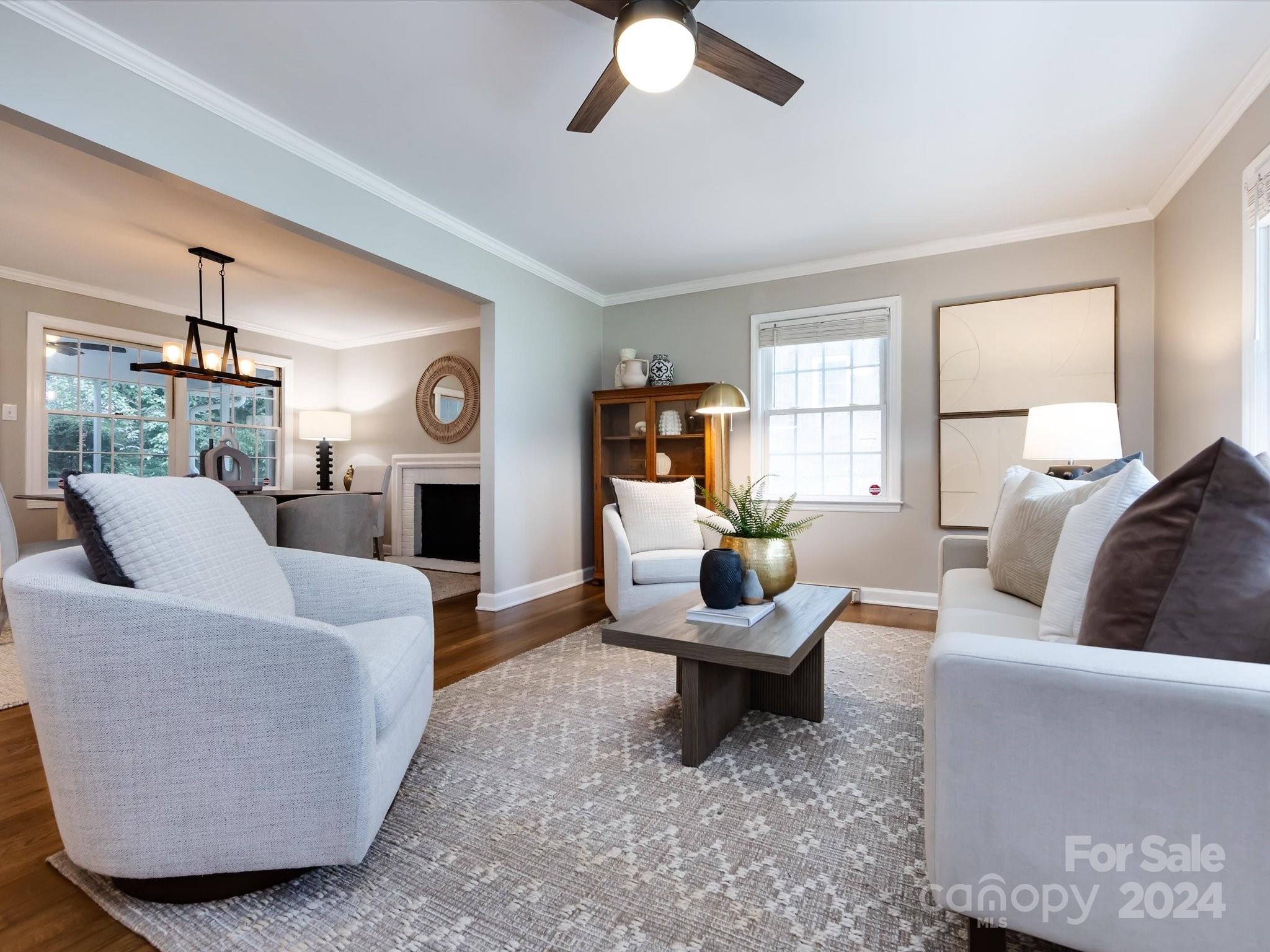 3133 Spring Valley Road Charlotte, NC 28210 - Photo 3 of 25 a living room with fireplace furniture and a large window