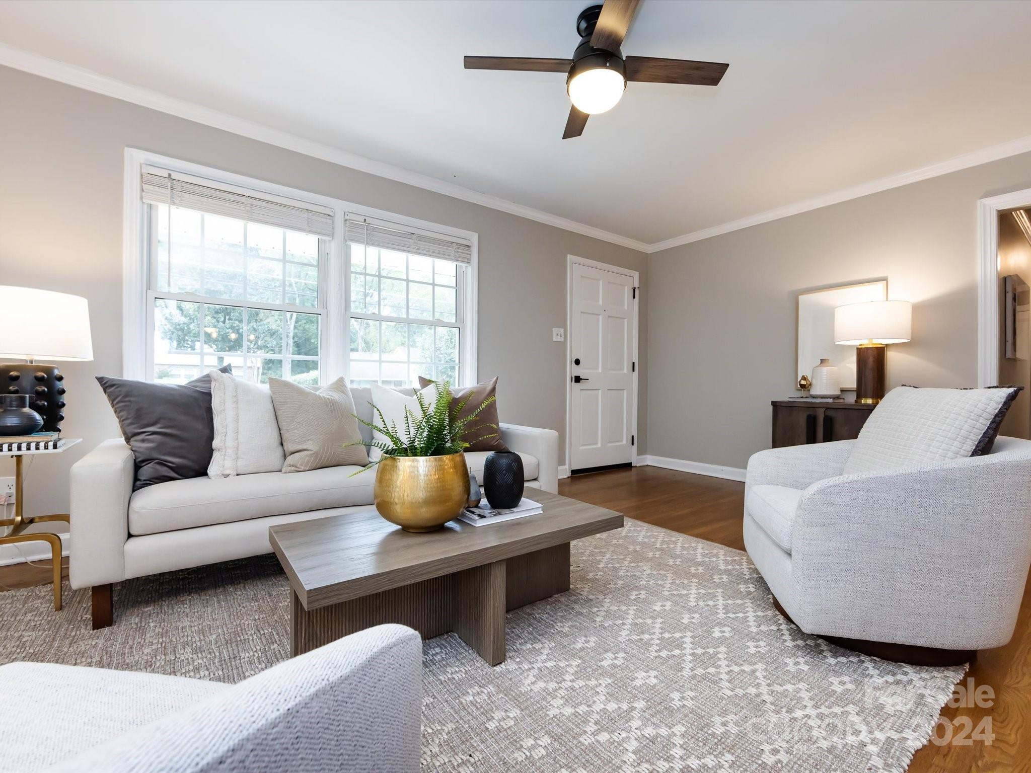 3133 Spring Valley Road Charlotte, NC 28210 - Photo 4 of 25 a living room with furniture and a large window