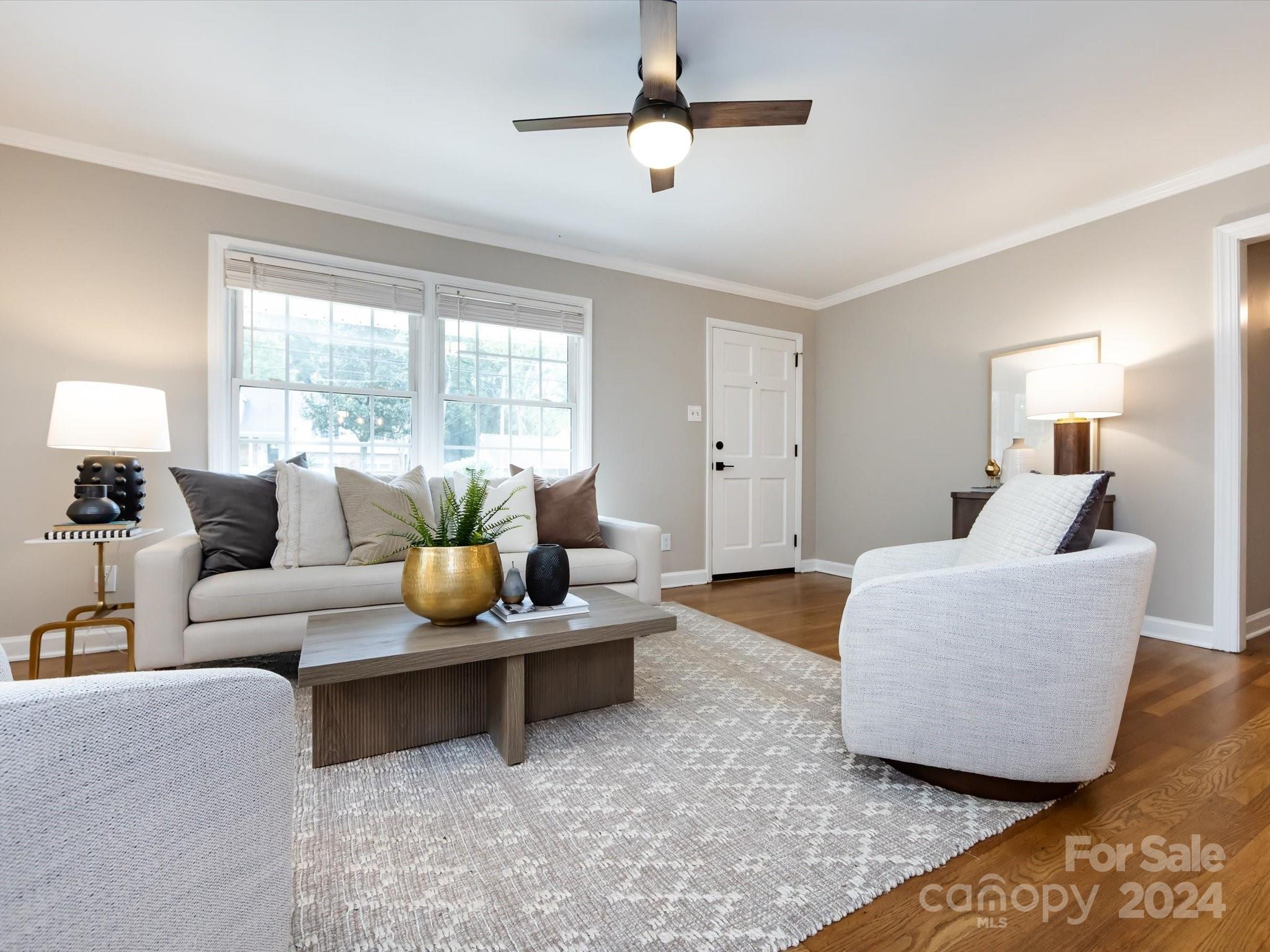 3133 Spring Valley Road Charlotte, NC 28210 - Photo 6 of 25 a living room with furniture and a large window