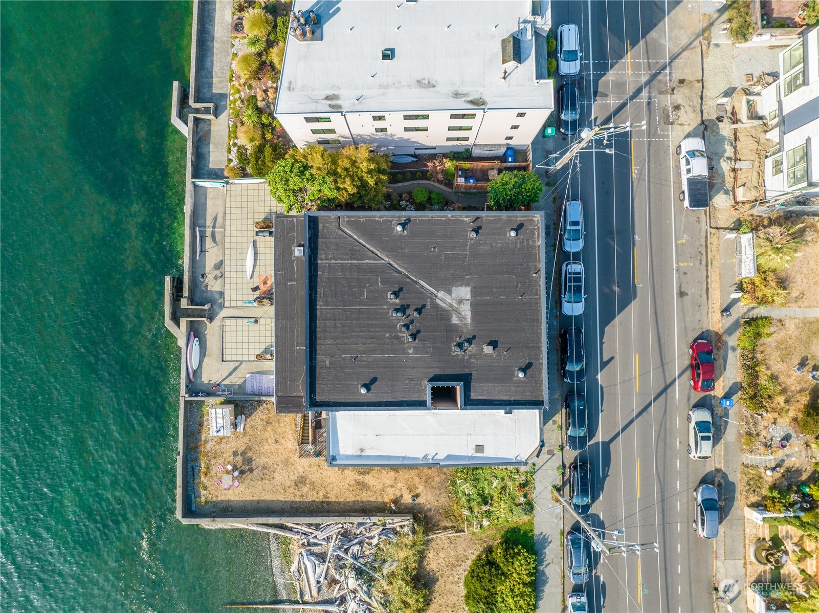4027 Beach Drive Southwest Seattle, WA 98116 - Photo 14 of 15 a aerial view of a house with a swimming pool