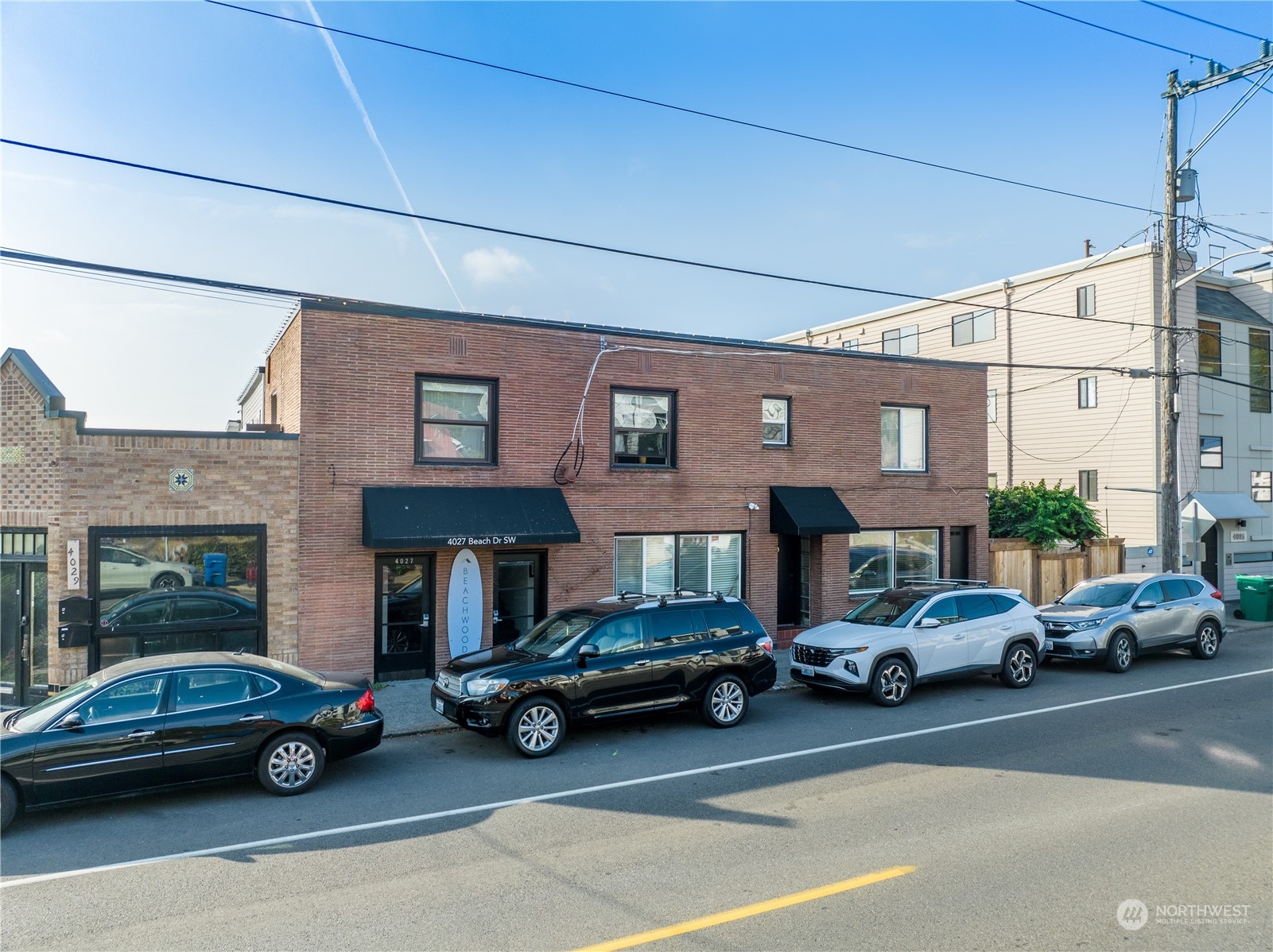 4027 Beach Drive Southwest Seattle, WA 98116 - Photo 15 of 15 a car parked in front of a building