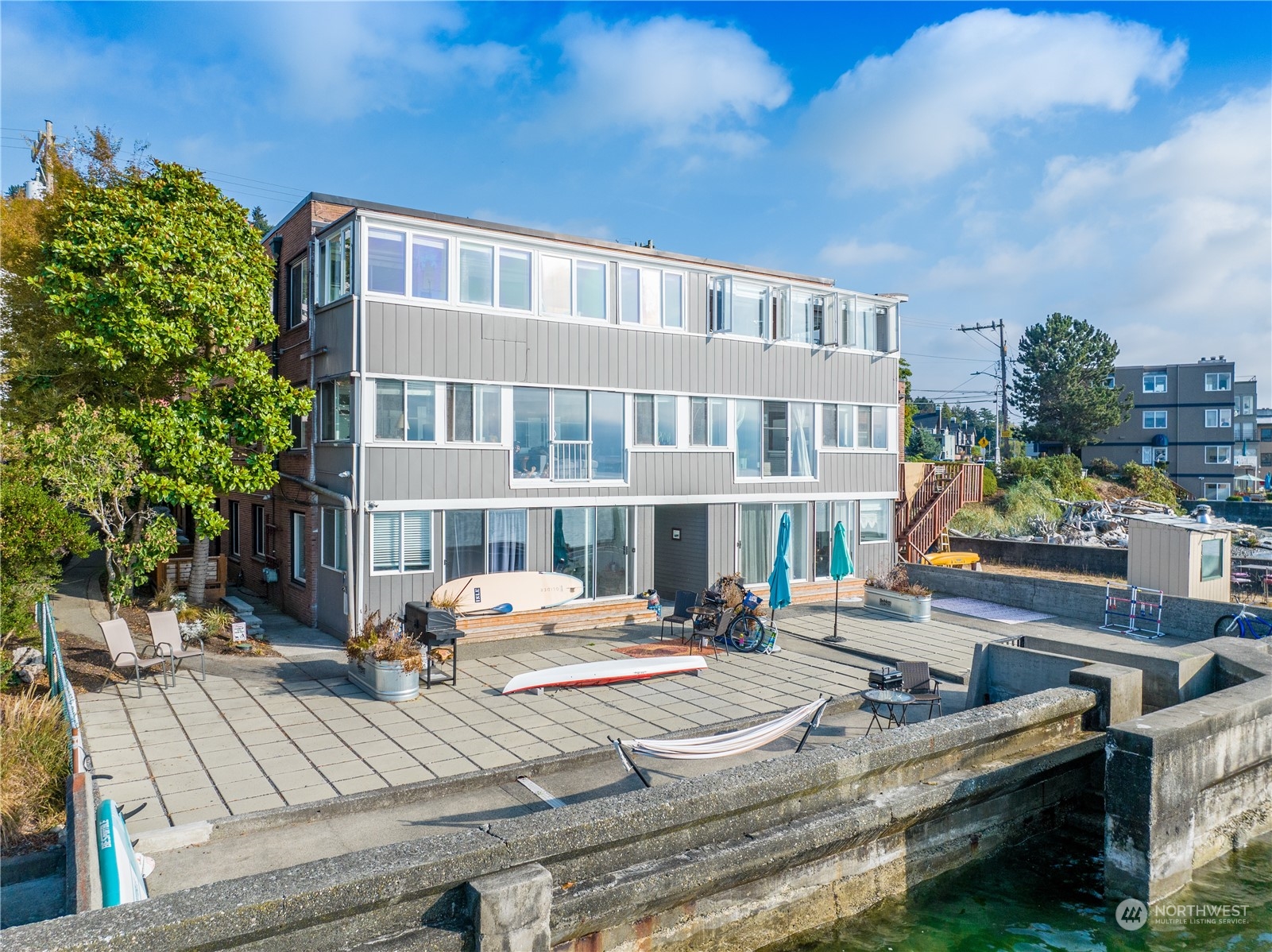 4027 Beach Drive Southwest Seattle, WA 98116 - Photo 10 of 15 a front view of a building with street view