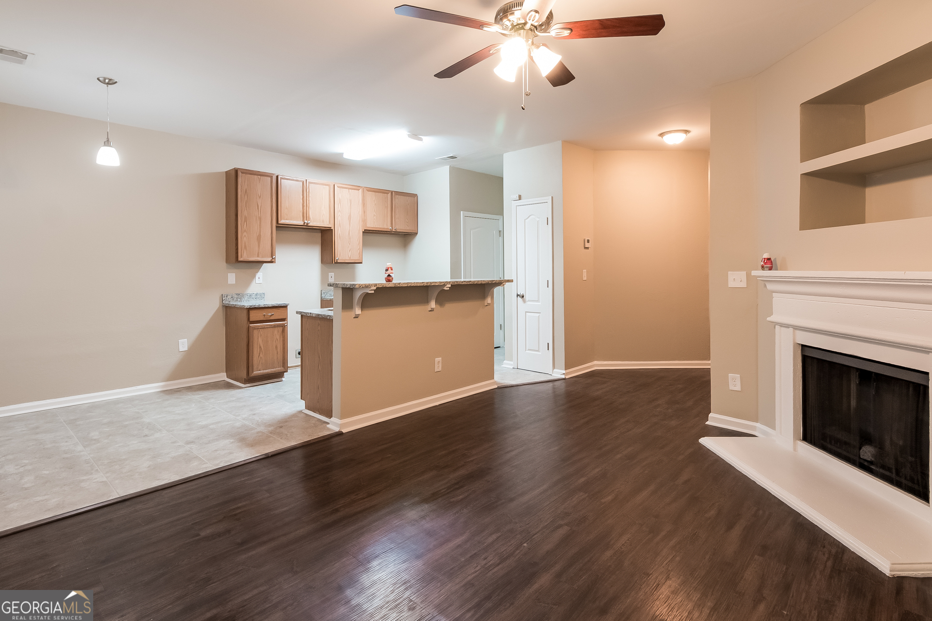 2839 Windsor Forrest Court College Park, GA 30349 - Photo 2 of 15 a view of a kitchen with a stove wooden floor and a kitchen