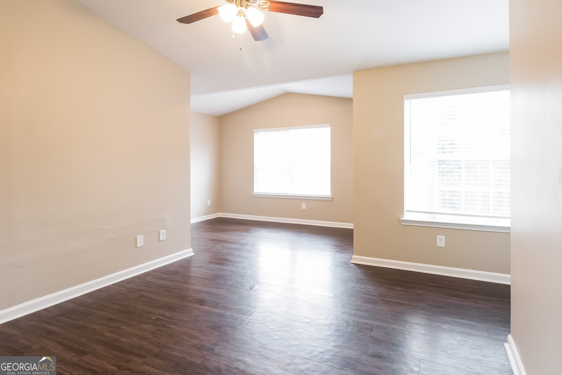 2839 Windsor Forrest Court College Park, GA 30349 - Photo 8 of 15 an empty room with wooden floor and windows