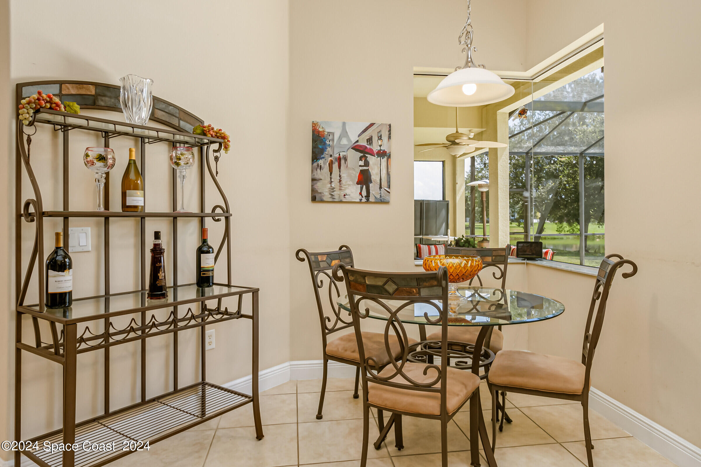 5972 Goleta Circle Melbourne, FL 32940 - Photo 26 of 56 a view of a dining room with furniture window and outside view