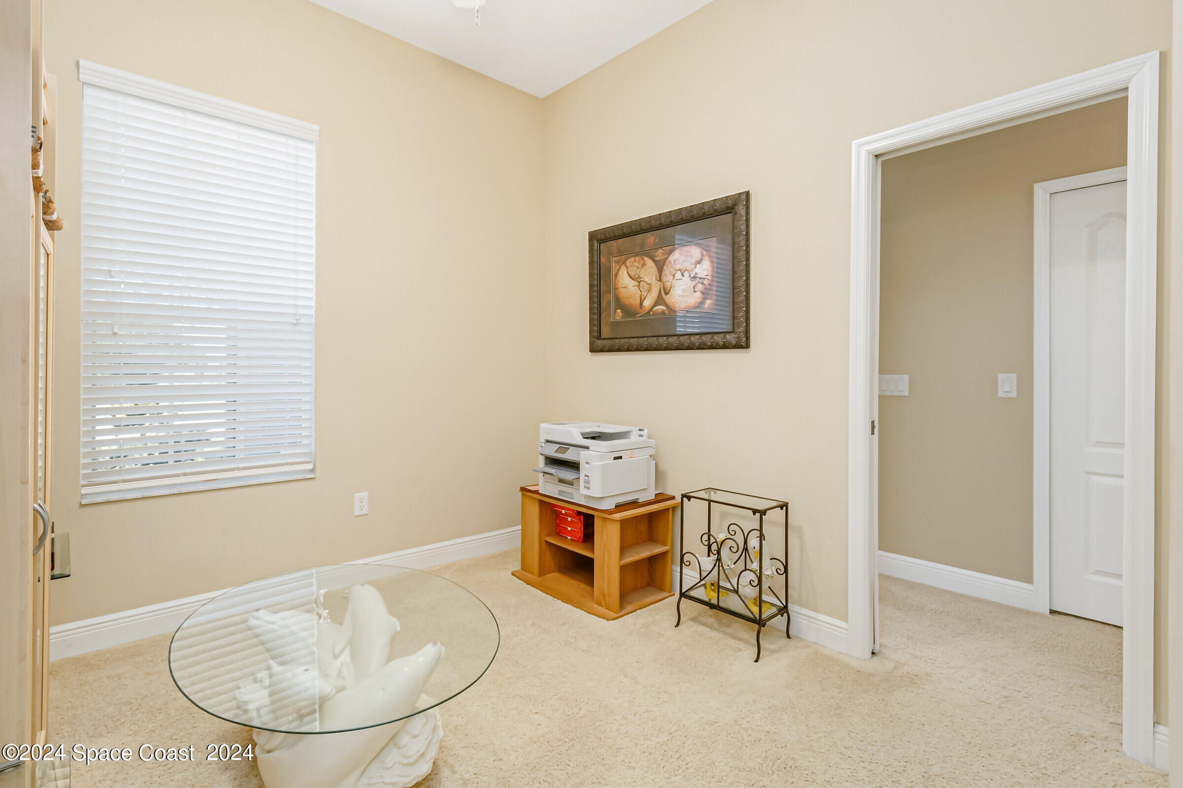5972 Goleta Circle Melbourne, FL 32940 - Photo 31 of 56 an entryway with table and couch